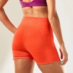 Like new! Athleta Ultimate 3” shorts bright orange size large running yoga swim